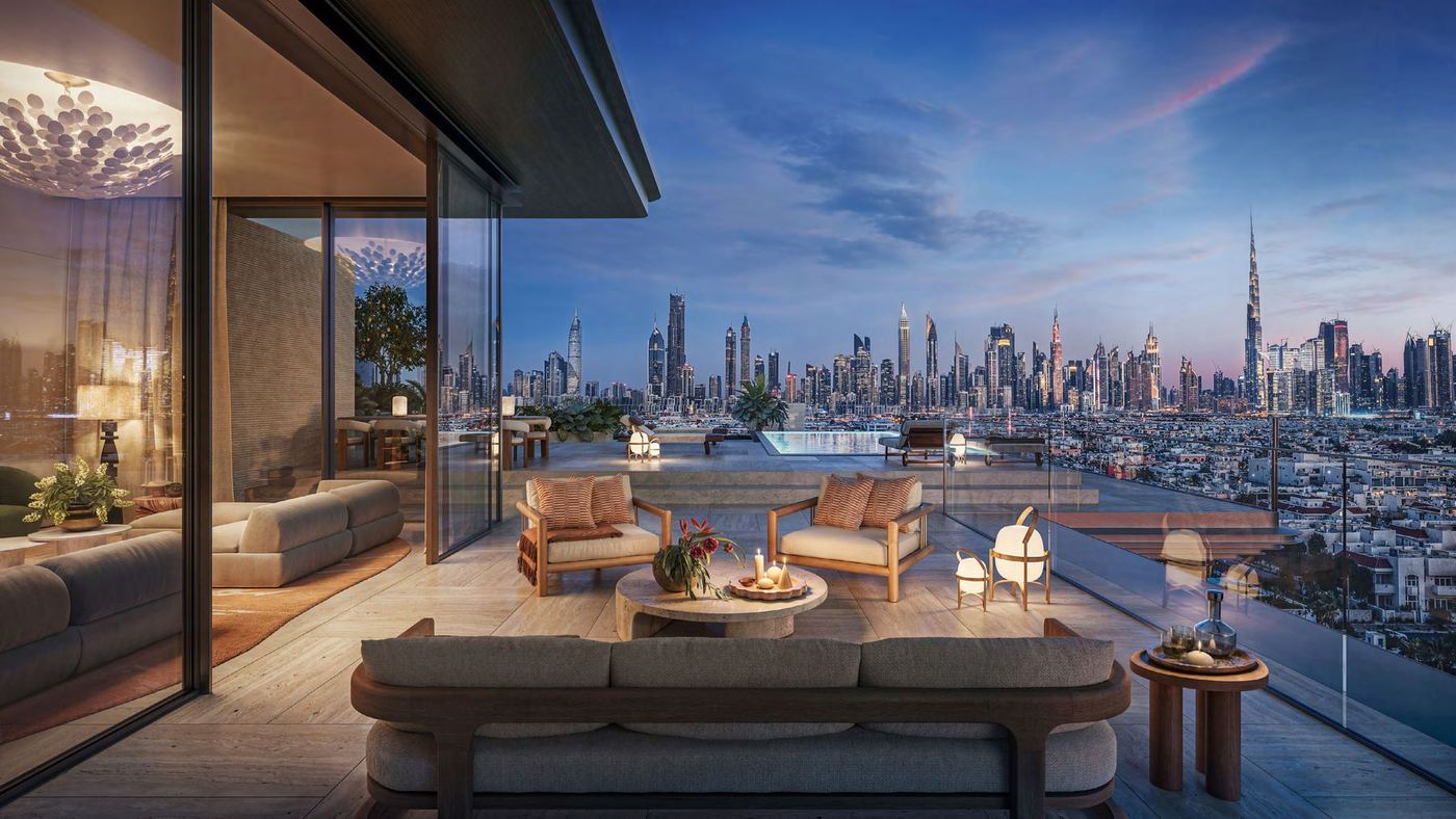 Penthouse terrace at dusk with skyline view
